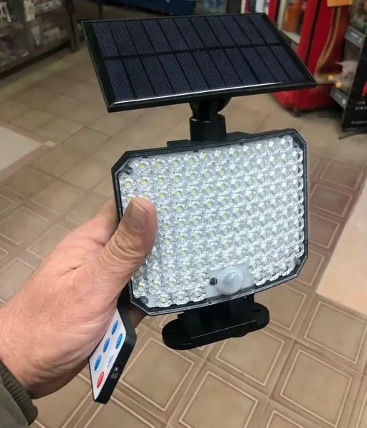 Світильник на сонячній батареї з датчиком руху Solar wall lamp BL-104-SMD 2097728725 фото